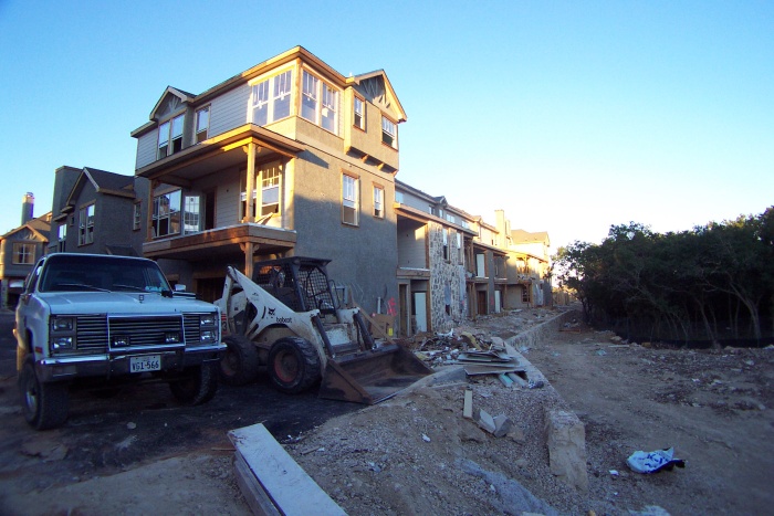 Who's bigger, the truck or the Bobcat?